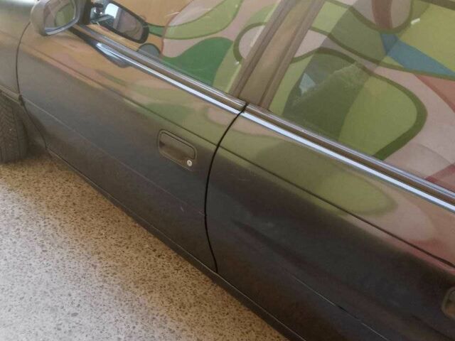 Черный Опель Астра, объемом двигателя 1.6 л и пробегом 500 тыс. км за 1850 $, фото 3 на Automoto.ua