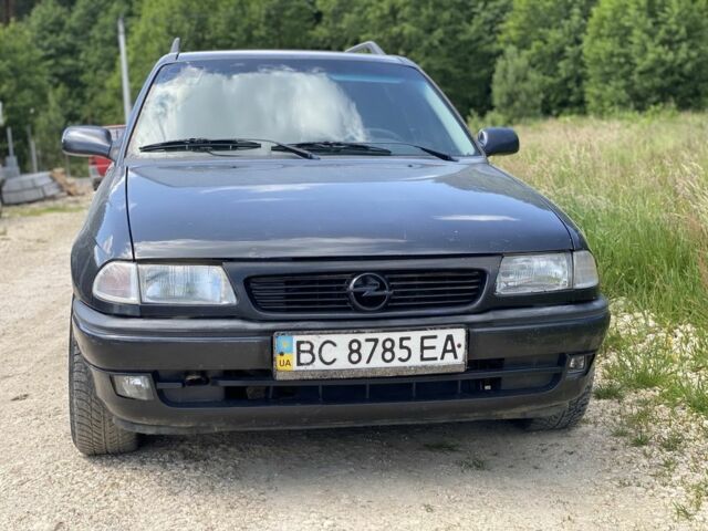 Чорний Опель Астра, об'ємом двигуна 1.6 л та пробігом 300 тис. км за 1550 $, фото 1 на Automoto.ua