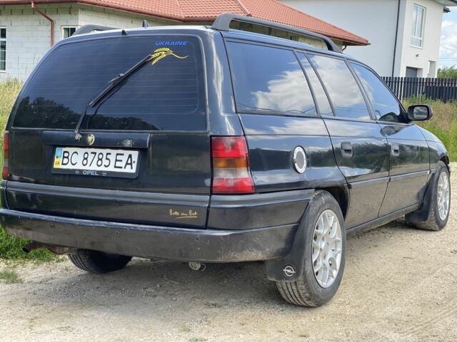 Чорний Опель Астра, об'ємом двигуна 1.6 л та пробігом 300 тис. км за 1550 $, фото 9 на Automoto.ua