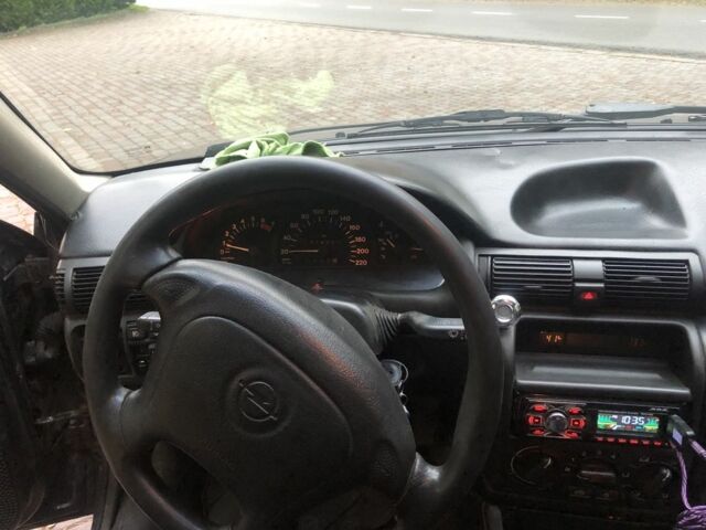 Черный Опель Астра, объемом двигателя 1.8 л и пробегом 1 тыс. км за 899 $, фото 9 на Automoto.ua