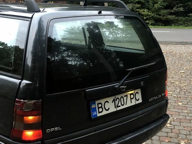 Черный Опель Астра, объемом двигателя 1.8 л и пробегом 1 тыс. км за 899 $, фото 4 на Automoto.ua