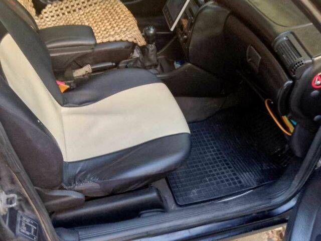 Черный Опель Астра, объемом двигателя 1.6 л и пробегом 500 тыс. км за 1850 $, фото 8 на Automoto.ua