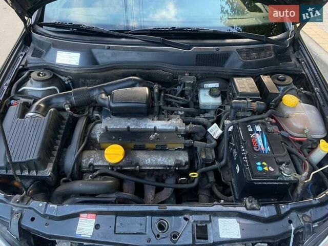 Черный Опель Астра, объемом двигателя 1.6 л и пробегом 248 тыс. км за 3200 $, фото 12 на Automoto.ua