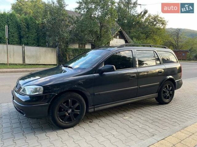 Черный Опель Астра, объемом двигателя 1.6 л и пробегом 248 тыс. км за 3200 $, фото 9 на Automoto.ua