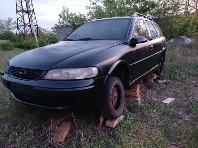 Черный Опель Астра, объемом двигателя 2 л и пробегом 200 тыс. км за 237 $, фото 5 на Automoto.ua