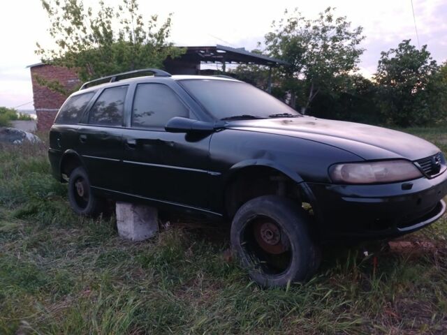 Черный Опель Астра, объемом двигателя 2 л и пробегом 200 тыс. км за 237 $, фото 6 на Automoto.ua