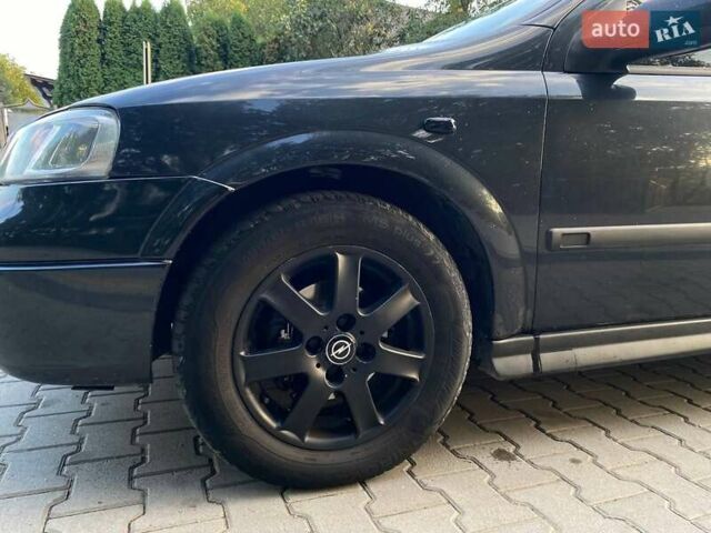 Черный Опель Астра, объемом двигателя 1.6 л и пробегом 248 тыс. км за 3200 $, фото 7 на Automoto.ua