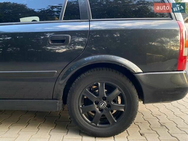 Черный Опель Астра, объемом двигателя 1.6 л и пробегом 248 тыс. км за 3200 $, фото 8 на Automoto.ua