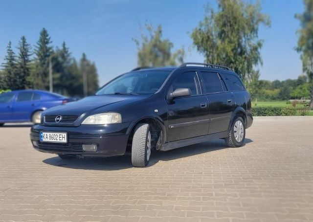 Черный Опель Астра, объемом двигателя 1.6 л и пробегом 292 тыс. км за 3500 $, фото 12 на Automoto.ua
