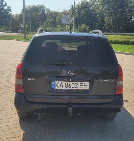 Черный Опель Астра, объемом двигателя 1.6 л и пробегом 292 тыс. км за 3500 $, фото 2 на Automoto.ua