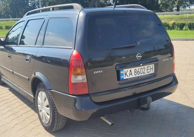 Черный Опель Астра, объемом двигателя 1.6 л и пробегом 292 тыс. км за 3500 $, фото 4 на Automoto.ua