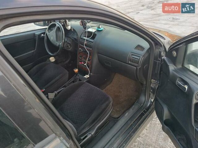 Черный Опель Астра, объемом двигателя 1.7 л и пробегом 360 тыс. км за 2750 $, фото 9 на Automoto.ua