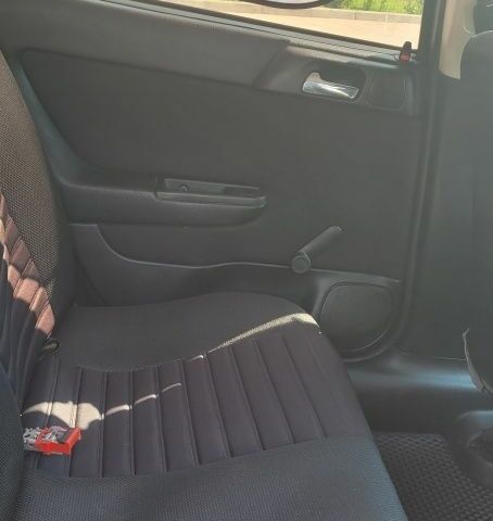 Черный Опель Астра, объемом двигателя 1.6 л и пробегом 292 тыс. км за 3500 $, фото 6 на Automoto.ua