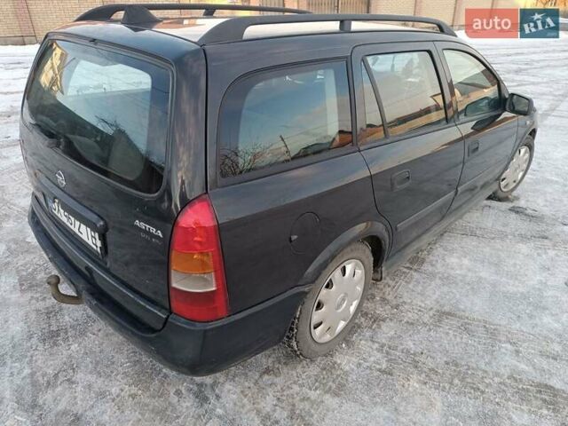 Черный Опель Астра, объемом двигателя 1.7 л и пробегом 360 тыс. км за 2750 $, фото 4 на Automoto.ua