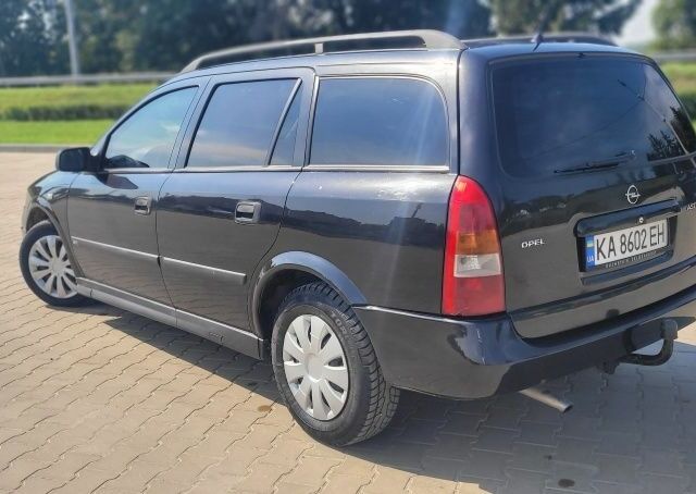 Черный Опель Астра, объемом двигателя 1.6 л и пробегом 292 тыс. км за 3500 $, фото 19 на Automoto.ua