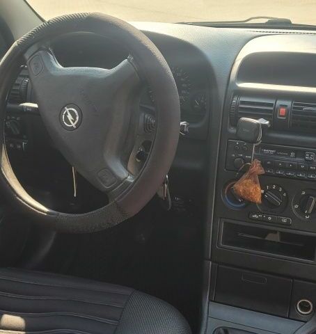 Черный Опель Астра, объемом двигателя 1.6 л и пробегом 292 тыс. км за 3500 $, фото 8 на Automoto.ua