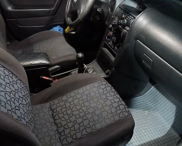 Чорний Опель Астра, об'ємом двигуна 2 л та пробігом 321 тис. км за 3100 $, фото 23 на Automoto.ua