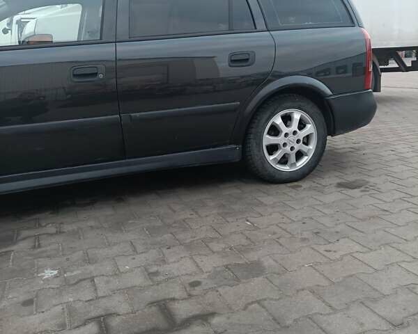 Чорний Опель Астра, об'ємом двигуна 2 л та пробігом 321 тис. км за 3100 $, фото 5 на Automoto.ua