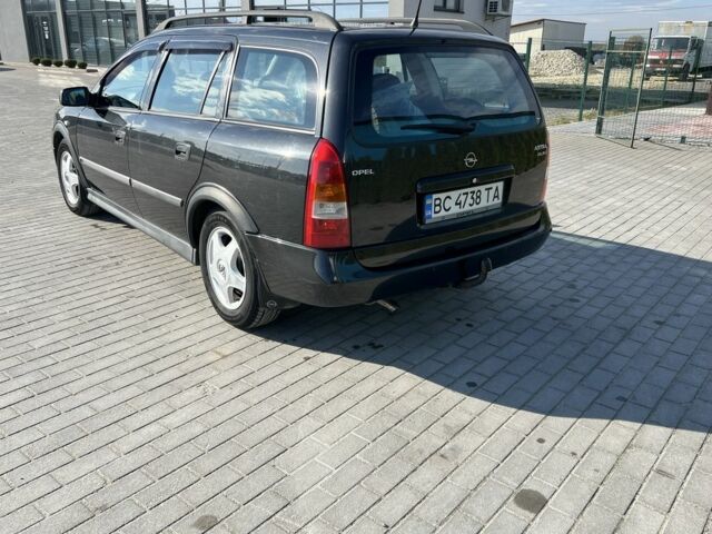 Черный Опель Астра, объемом двигателя 2 л и пробегом 293 тыс. км за 2150 $, фото 3 на Automoto.ua