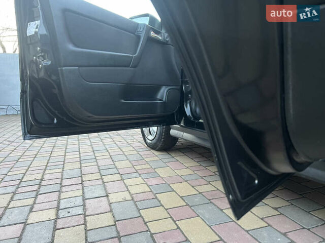 Черный Опель Астра, объемом двигателя 2 л и пробегом 223 тыс. км за 2999 $, фото 33 на Automoto.ua