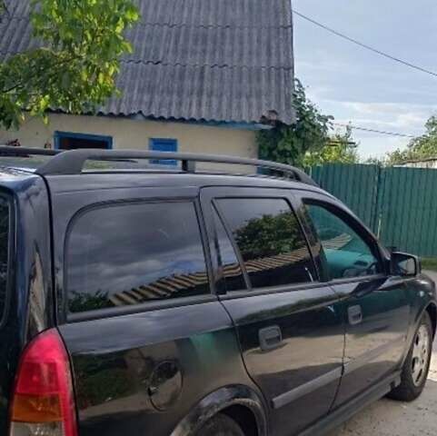 Чорний Опель Астра, об'ємом двигуна 2 л та пробігом 427 тис. км за 3600 $, фото 1 на Automoto.ua