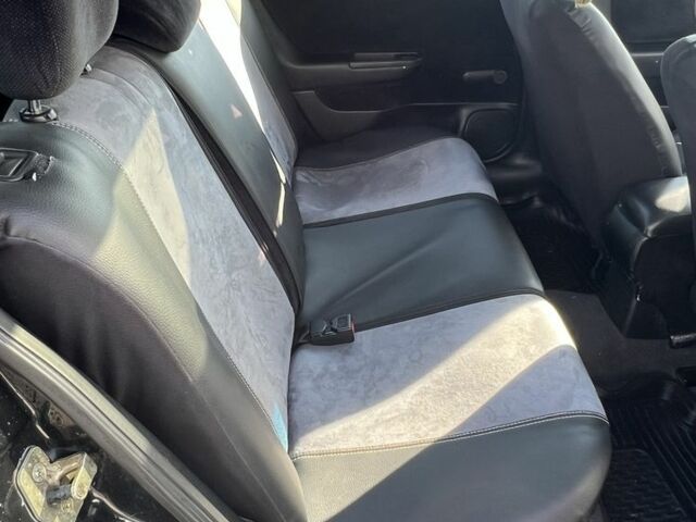 Черный Опель Астра, объемом двигателя 2 л и пробегом 293 тыс. км за 2150 $, фото 5 на Automoto.ua