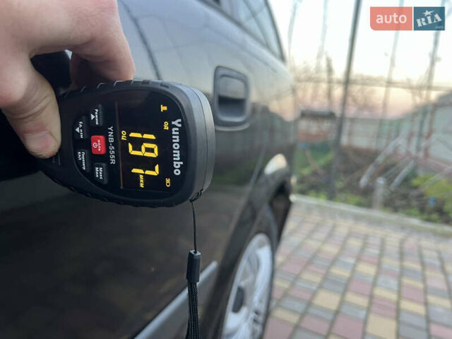 Черный Опель Астра, объемом двигателя 2 л и пробегом 223 тыс. км за 2999 $, фото 44 на Automoto.ua