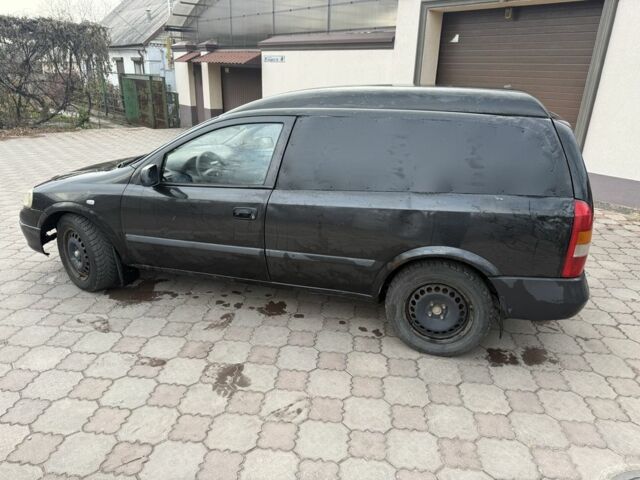Черный Опель Астра, объемом двигателя 1.7 л и пробегом 666 тыс. км за 1375 $, фото 7 на Automoto.ua