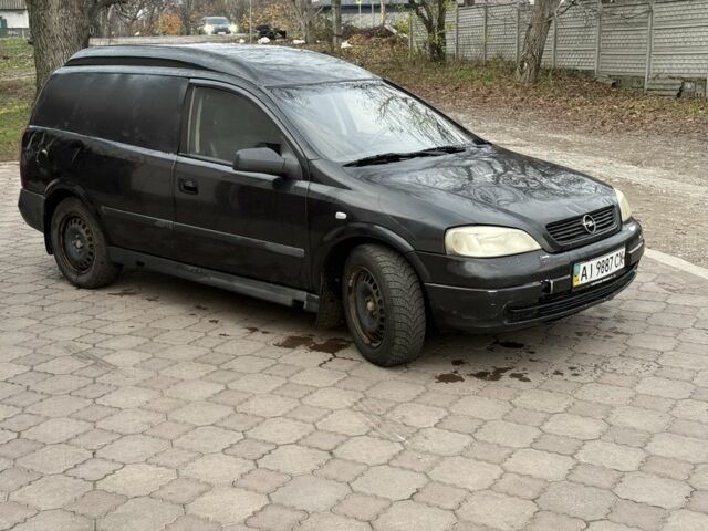 Черный Опель Астра, объемом двигателя 1.7 л и пробегом 666 тыс. км за 1375 $, фото 2 на Automoto.ua