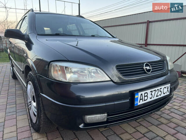 Черный Опель Астра, объемом двигателя 2 л и пробегом 223 тыс. км за 2999 $, фото 6 на Automoto.ua