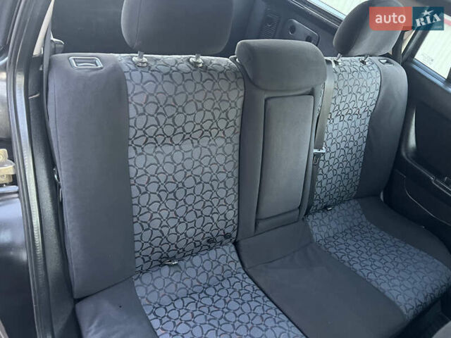 Черный Опель Астра, объемом двигателя 2 л и пробегом 223 тыс. км за 2999 $, фото 28 на Automoto.ua