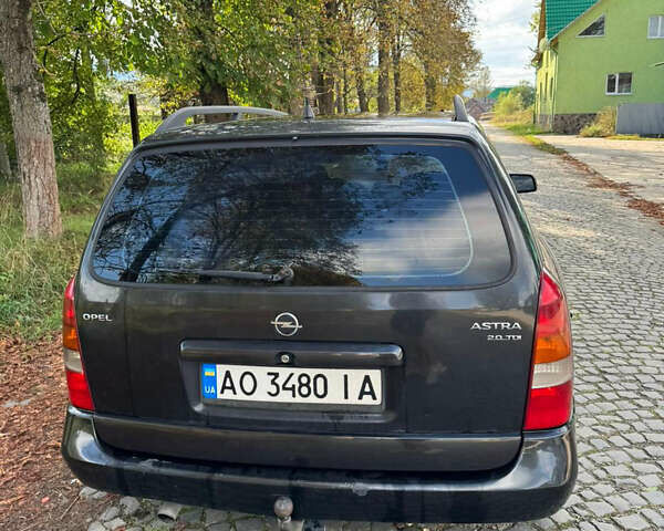 Чорний Опель Астра, об'ємом двигуна 2 л та пробігом 372 тис. км за 2650 $, фото 5 на Automoto.ua
