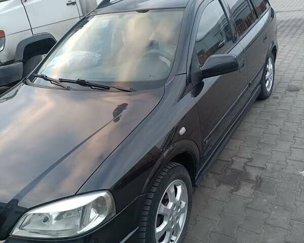 Чорний Опель Астра, об'ємом двигуна 2 л та пробігом 321 тис. км за 3100 $, фото 9 на Automoto.ua
