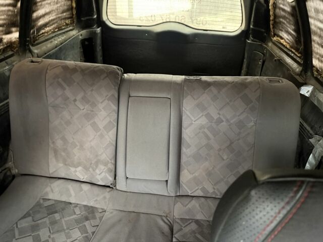 Черный Опель Астра, объемом двигателя 1.7 л и пробегом 666 тыс. км за 1375 $, фото 11 на Automoto.ua