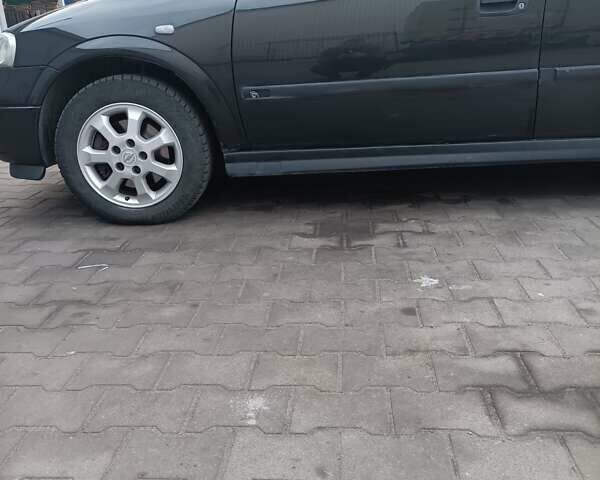 Чорний Опель Астра, об'ємом двигуна 2 л та пробігом 321 тис. км за 3100 $, фото 6 на Automoto.ua