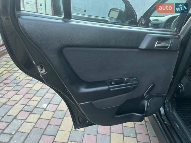 Черный Опель Астра, объемом двигателя 2 л и пробегом 223 тыс. км за 2999 $, фото 35 на Automoto.ua