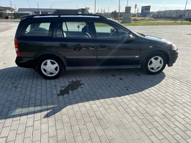 Черный Опель Астра, объемом двигателя 2 л и пробегом 293 тыс. км за 2150 $, фото 4 на Automoto.ua