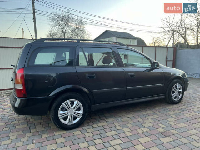 Черный Опель Астра, объемом двигателя 2 л и пробегом 223 тыс. км за 2999 $, фото 10 на Automoto.ua