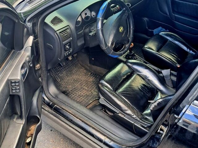 Чорний Опель Астра, об'ємом двигуна 2 л та пробігом 440 тис. км за 2000 $, фото 5 на Automoto.ua