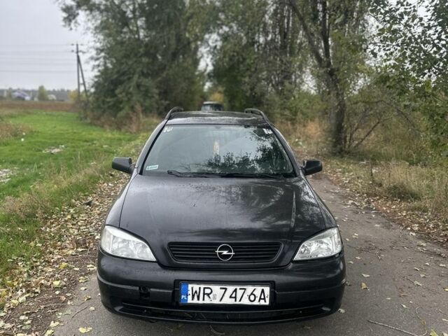 Черный Опель Астра, объемом двигателя 2 л и пробегом 258 тыс. км за 952 $, фото 7 на Automoto.ua