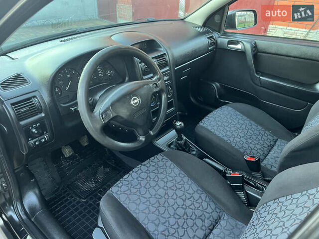 Черный Опель Астра, объемом двигателя 2 л и пробегом 223 тыс. км за 2999 $, фото 21 на Automoto.ua