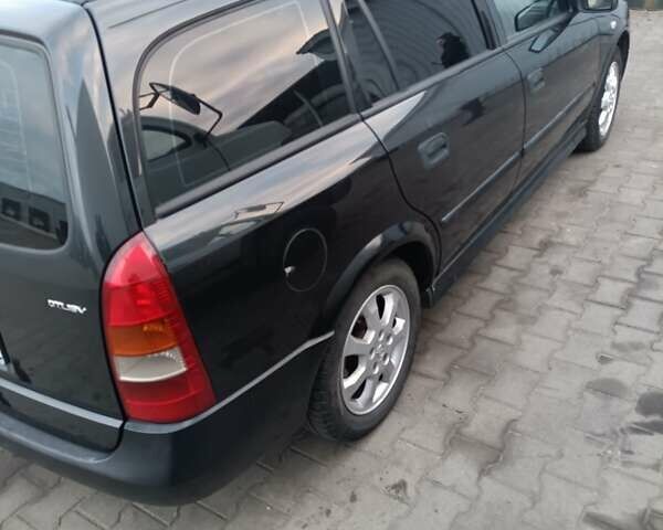 Чорний Опель Астра, об'ємом двигуна 2 л та пробігом 321 тис. км за 3100 $, фото 3 на Automoto.ua