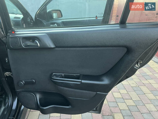 Черный Опель Астра, объемом двигателя 2 л и пробегом 223 тыс. км за 2999 $, фото 37 на Automoto.ua
