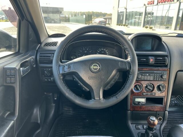 Черный Опель Астра, объемом двигателя 2 л и пробегом 293 тыс. км за 2150 $, фото 6 на Automoto.ua