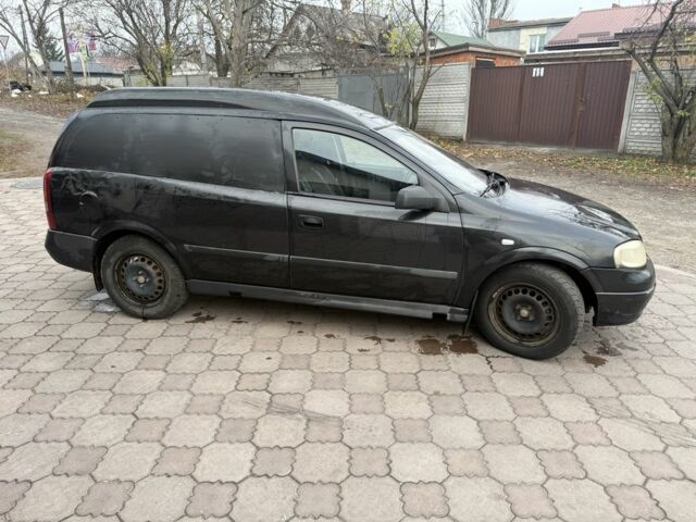Черный Опель Астра, объемом двигателя 1.7 л и пробегом 666 тыс. км за 1375 $, фото 3 на Automoto.ua