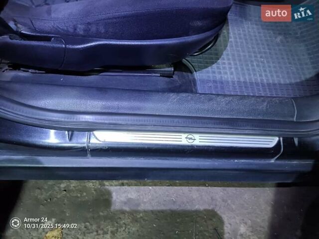 Чорний Опель Астра, об'ємом двигуна 2 л та пробігом 321 тис. км за 3100 $, фото 11 на Automoto.ua