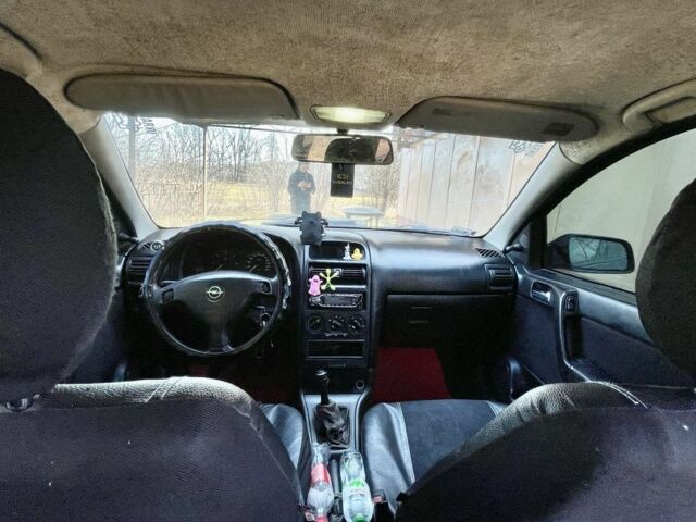 Черный Опель Астра, объемом двигателя 2 л и пробегом 400 тыс. км за 1250 $, фото 3 на Automoto.ua