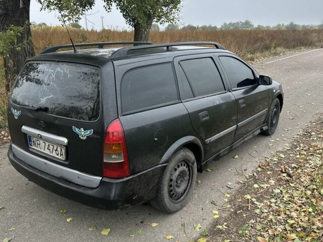 Черный Опель Астра, объемом двигателя 2 л и пробегом 258 тыс. км за 952 $, фото 11 на Automoto.ua