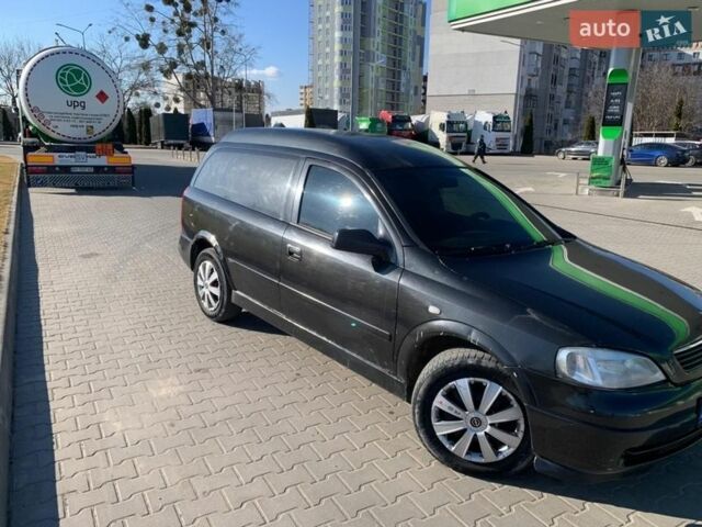 Черный Опель Астра, объемом двигателя 1.7 л и пробегом 176 тыс. км за 1750 $, фото 1 на Automoto.ua