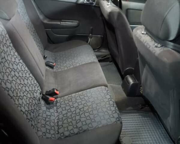 Чорний Опель Астра, об'ємом двигуна 2 л та пробігом 321 тис. км за 3100 $, фото 18 на Automoto.ua